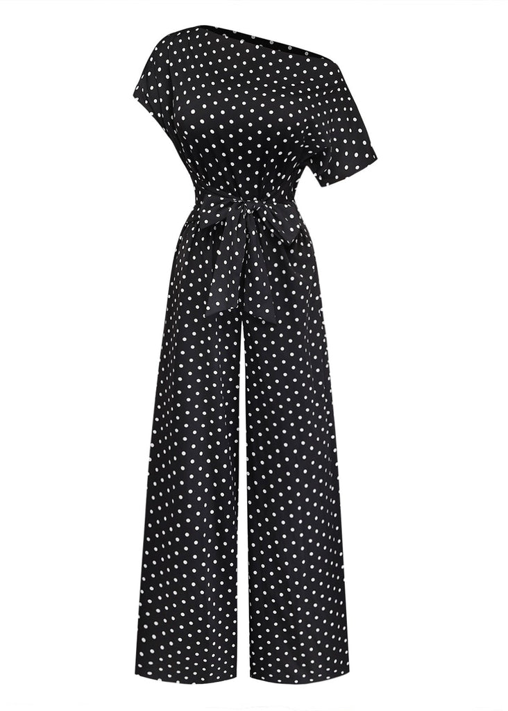 Combinaison noire à pois, épaules dénudées et nœud années 1950