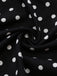 Combinaison noire à pois, épaules dénudées et nœud années 1950