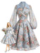[Prévente] Robe portefeuille bleue florale à revers contrasté et manches transparentes Années 1950