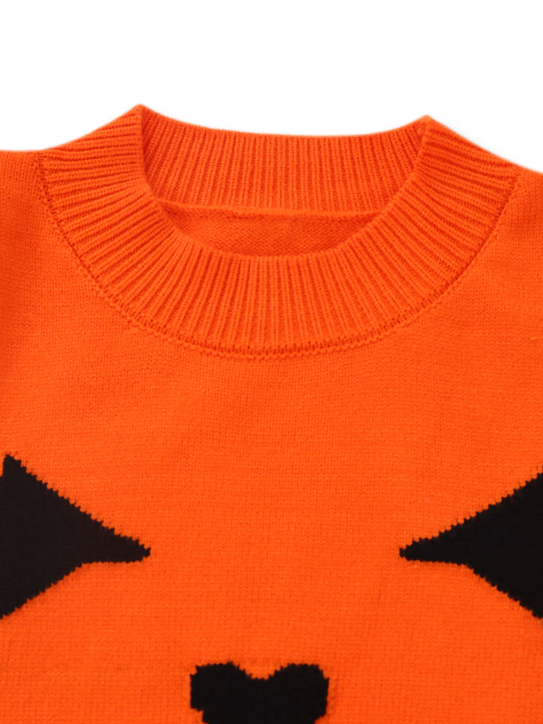 Pull orange en maille à visage de citrouille d’Halloween années 1970