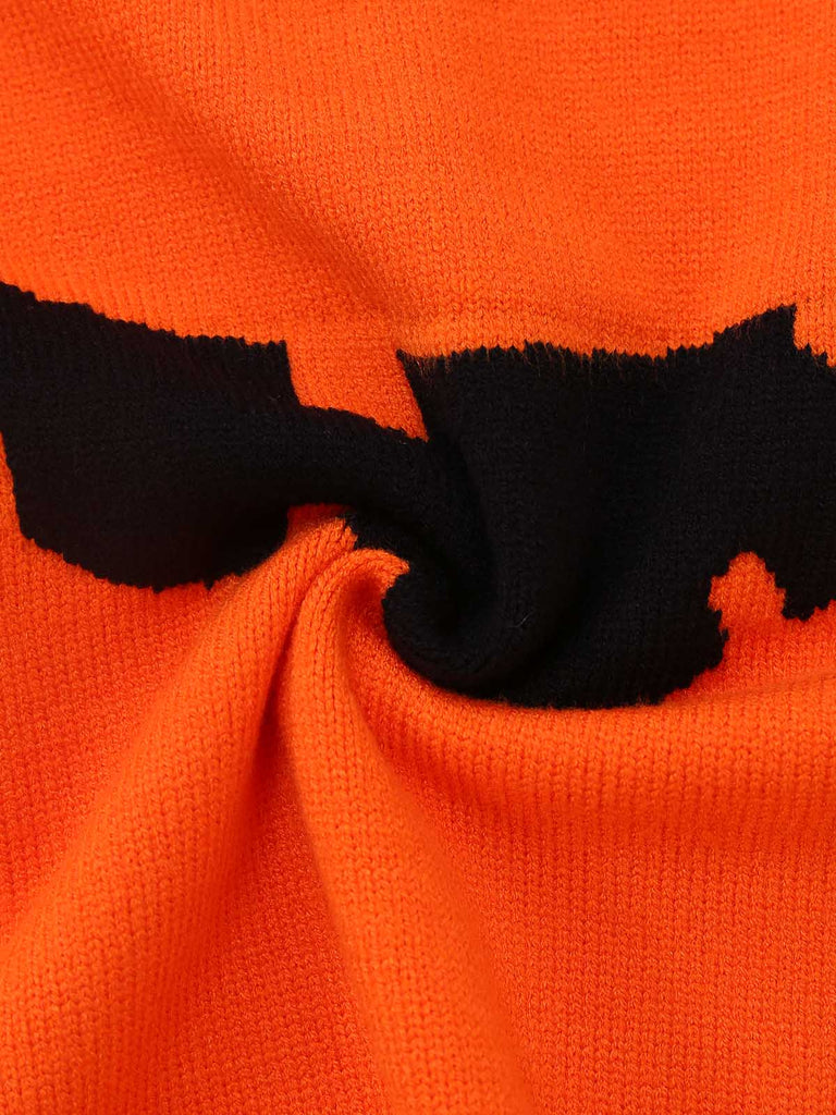 Pull orange en maille à visage de citrouille d’Halloween années 1970