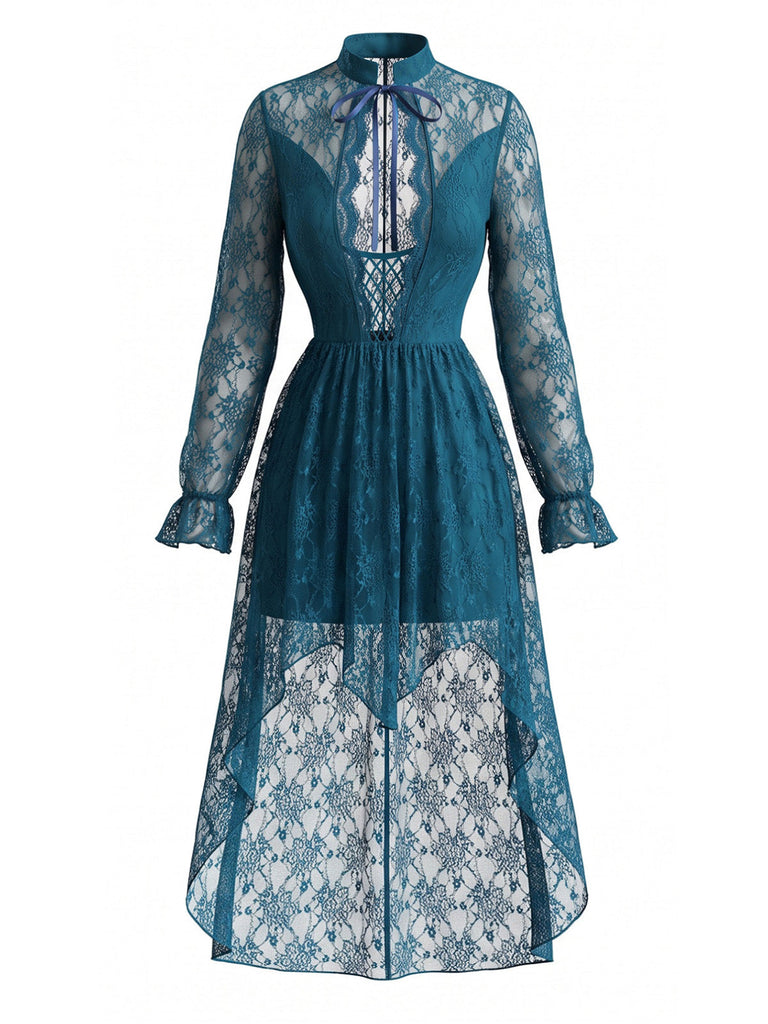 Robe bleu foncé à col V, dentelle, manches longues et ourlet asymétrique années 1970