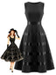 Robe noire ajustée sans manches à col rond et bordure satinée années 1950