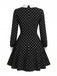 Robe noire à pois, col Chelsea et manches longues années 1950