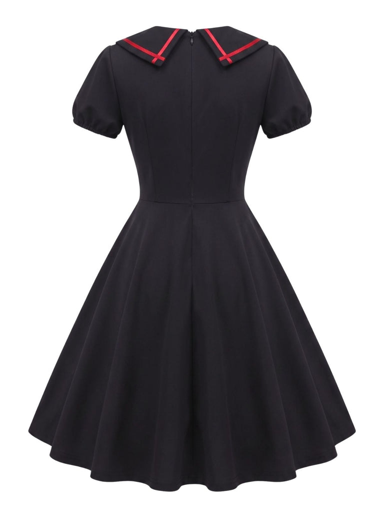 Robe évasée gothique noire à col chauve-souris et laçage années 1940
