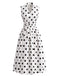 Robe à pois sans manches, revers, nœud et ceinture Années 1950