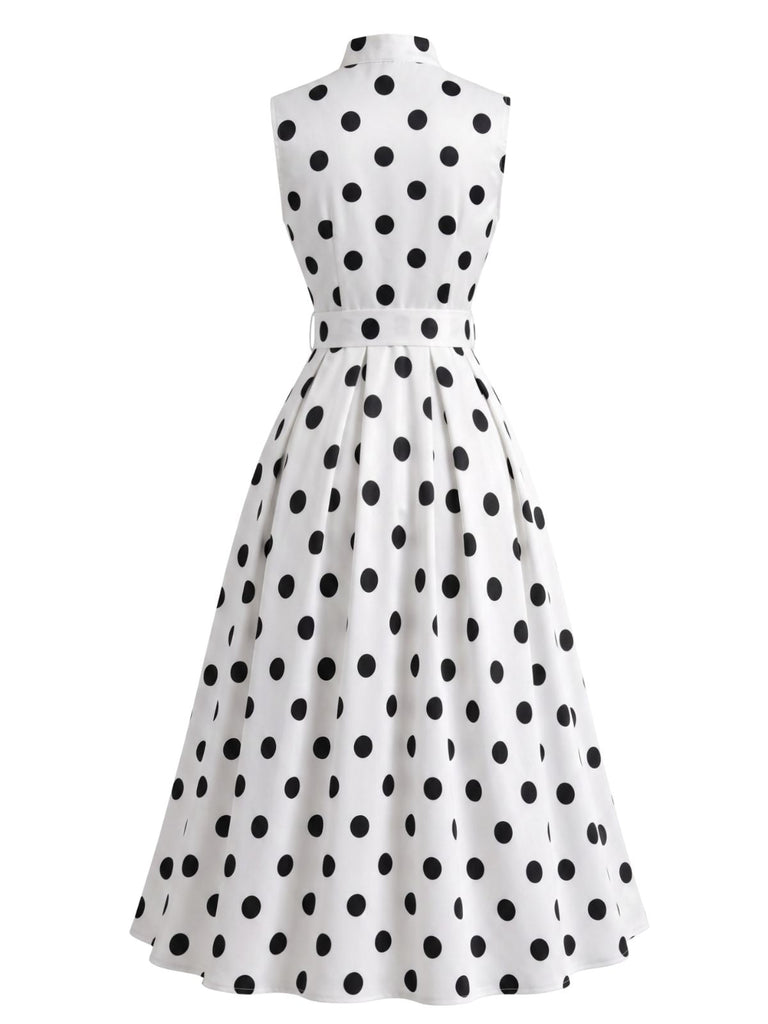 Robe à pois sans manches, revers, nœud et ceinture Années 1950