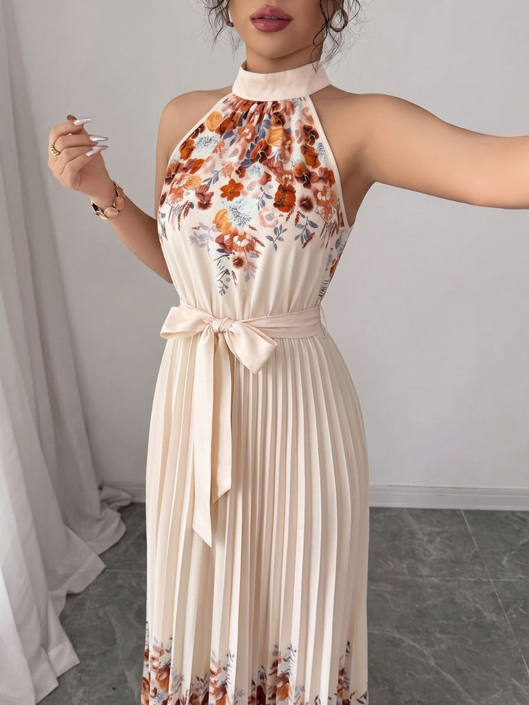 Robe longue beige fleurie, plissée, dos nu et taille nouée années 1950