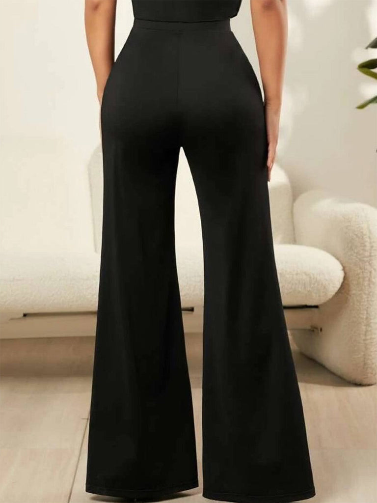 Pantalon évasé noir taille haute à empiècements de dentelle florale années 1950