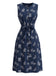 Robe ceinturée à col rond et motif de feuilles botaniques années 1950