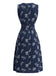 Robe ceinturée à col rond et motif de feuilles botaniques années 1950
