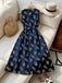 Robe ceinturée à col rond et motif de feuilles botaniques années 1950