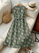 Robe ceinturée à col rond et motif de feuilles botaniques années 1950