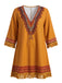 Robe bohème marron à col V et franges à pompons années 1970