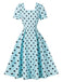 Robe évasée bleue à pois, col carré et manches bouffantes années 1950