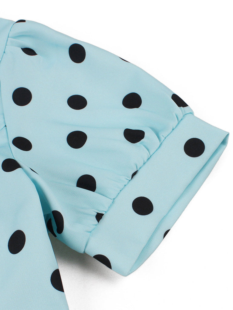 Robe évasée bleue à pois, col carré et manches bouffantes années 1950