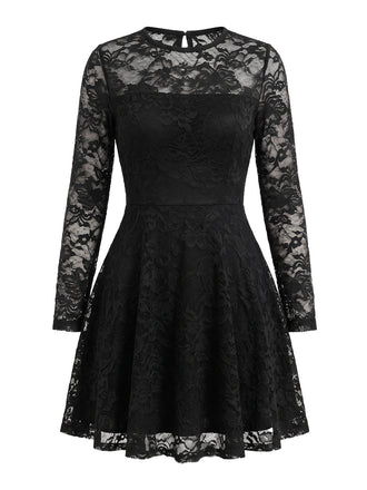 Robe courte noire en dentelle fleurie, empiècement transparent et manches longues années 1960 - 1