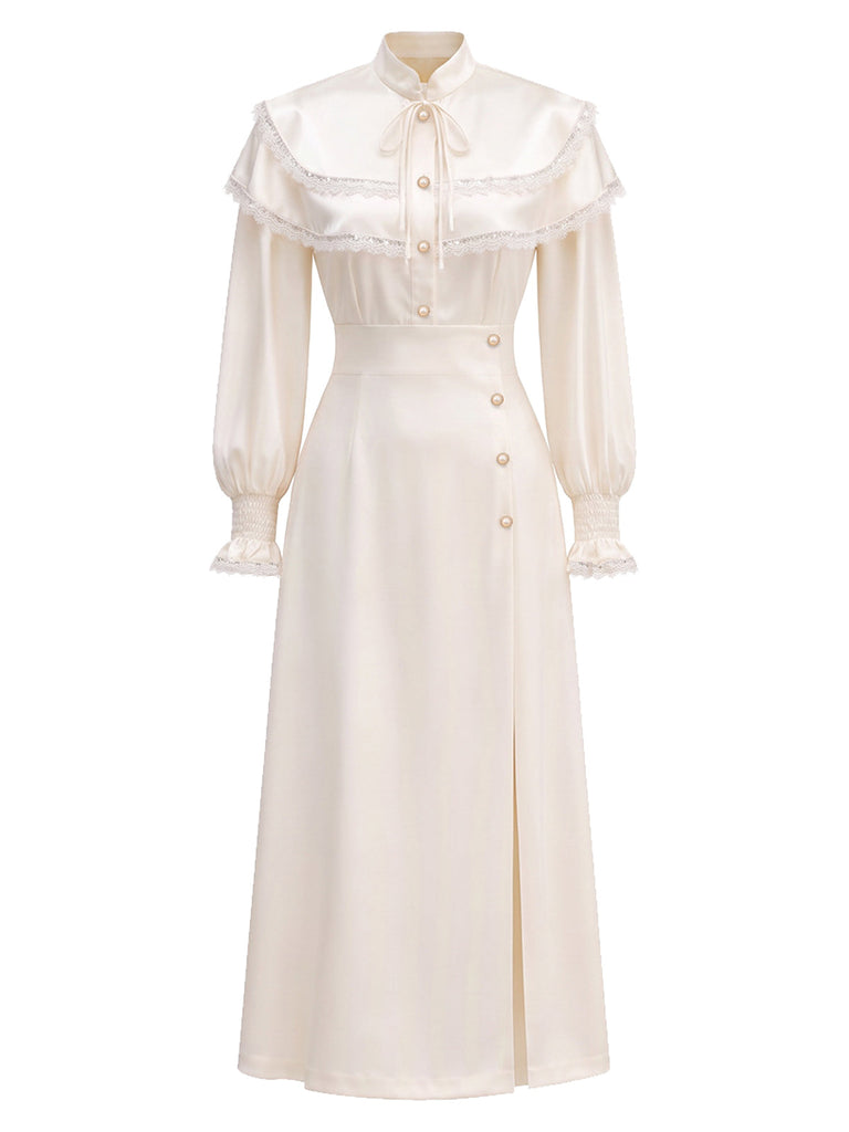 [Prévente] Robe beige à cape volantée, dentelle et manches ballon fendues années 1970 - 2