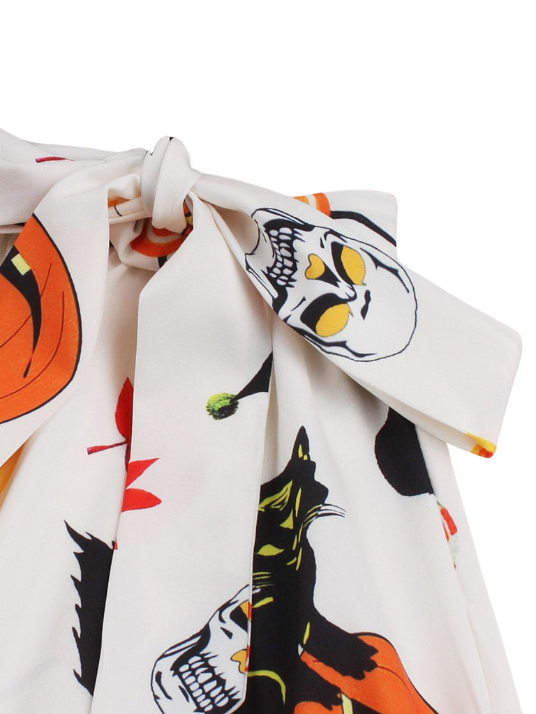 Robe d’Halloween à citrouilles et crânes, sans manches et ceinturée années 1950