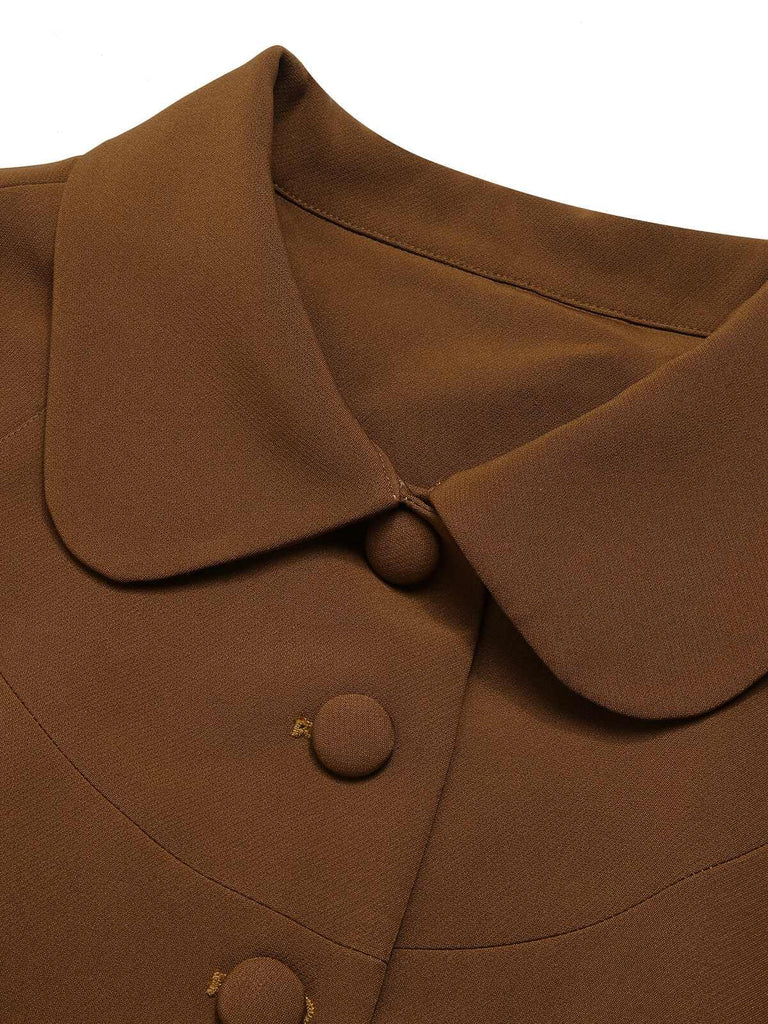 Manteau cape à revers couleur vert des années 1940