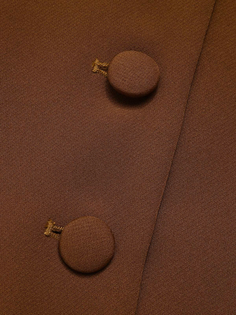 Manteau cape à revers couleur vert des années 1940