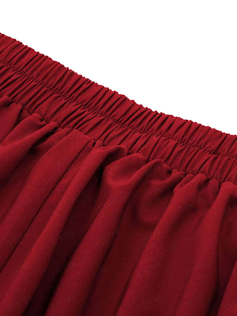 Jupe plissée taille haute rouge unie des années 1940