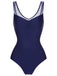 Maillot de bain croisé dos uni bleu profond des années 1930