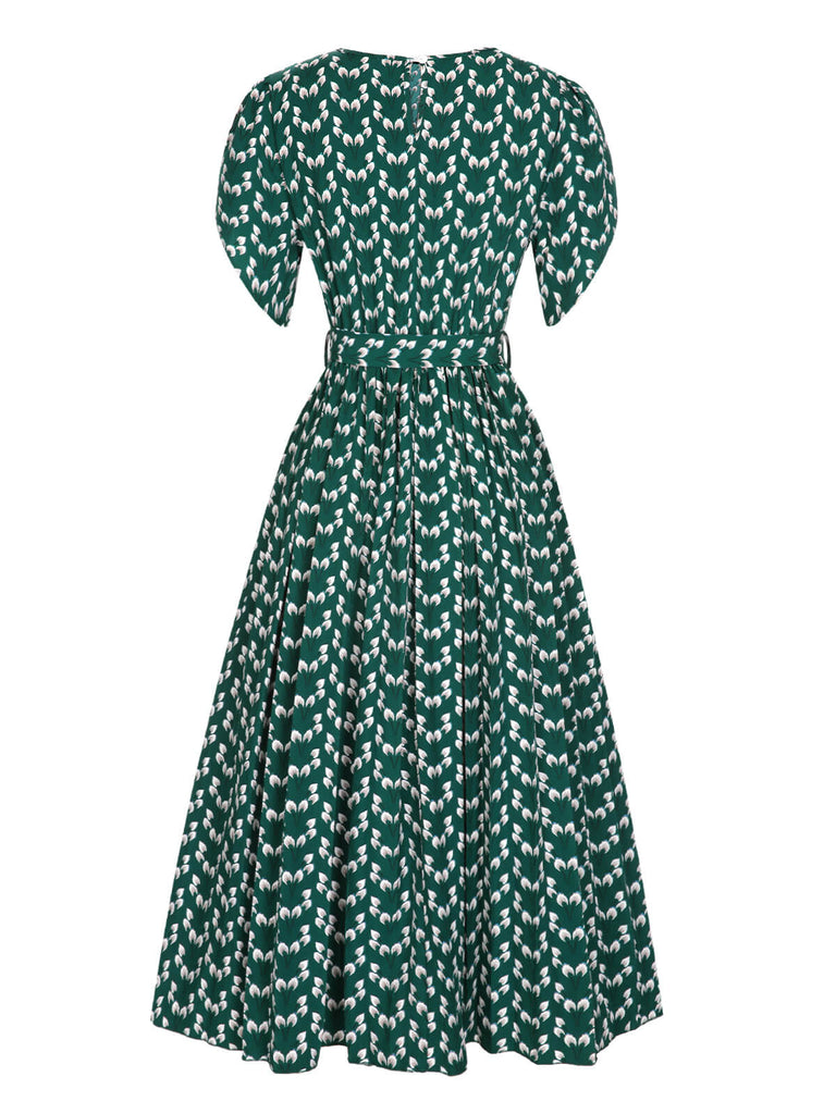 Robe fleurie verte des années 40 avec ceinture nouée