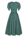Robe fleurie verte des années 40 avec ceinture nouée