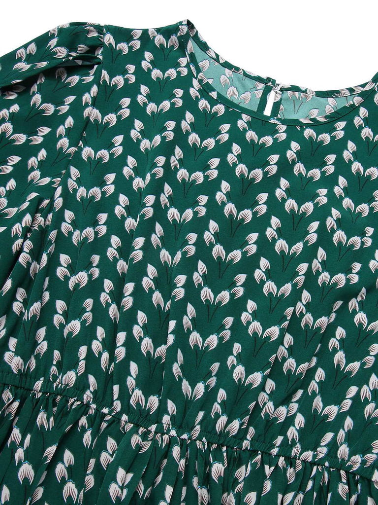 Robe fleurie verte des années 40 avec ceinture nouée
