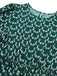 Robe fleurie verte des années 40 avec ceinture nouée
