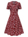 Robe marguerite à boutons revers vert des années 1950