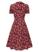 Robe marguerite à boutons revers vert des années 1950