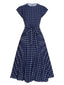 Robe à manches courtes à pois bleu royal des années 40