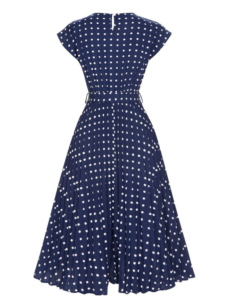 Robe à manches courtes à pois bleu royal des années 40