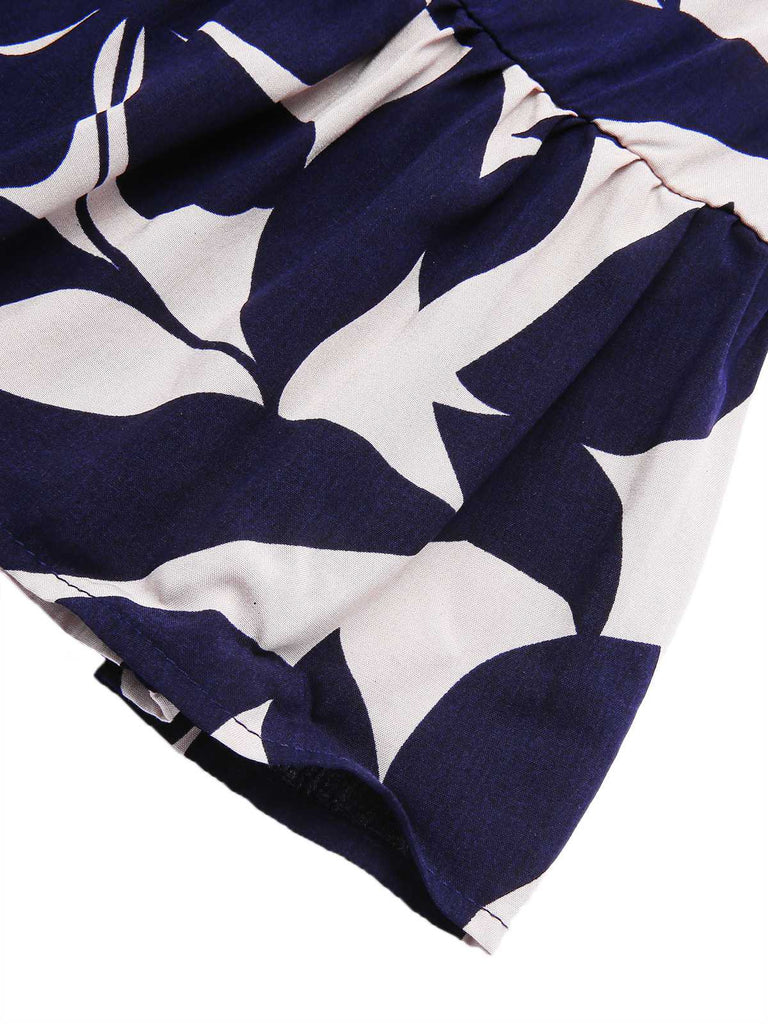 Robe fleurie dos nu bleu foncé des années 40