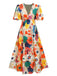 Robe fleurie à col en V et manches lanternes des années 1940