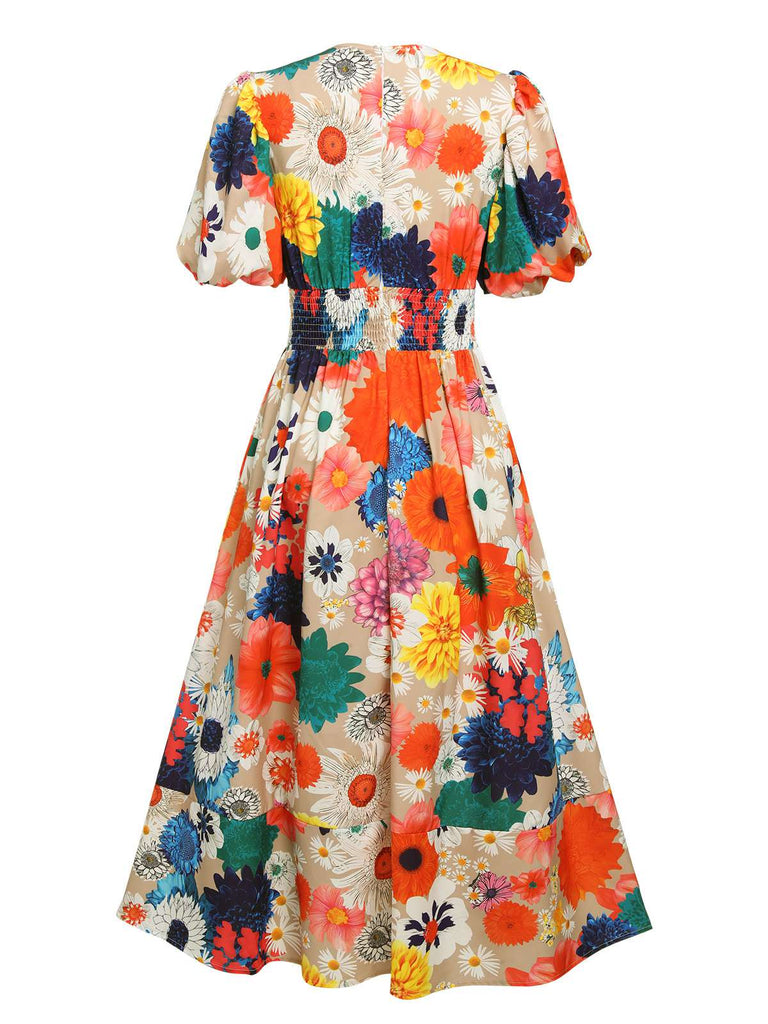 Robe fleurie à col en V et manches lanternes des années 1940