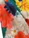 Robe fleurie à col en V et manches lanternes des années 1940