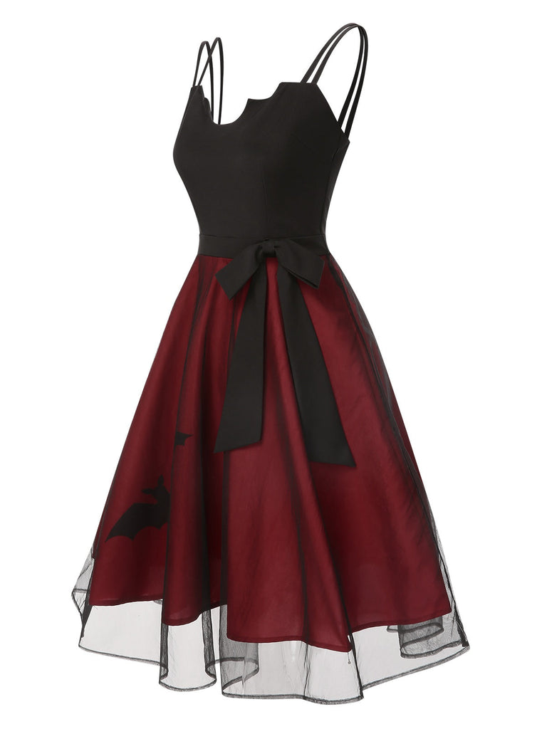 Robe en maille noire et rouge chauve-souris des années 1950