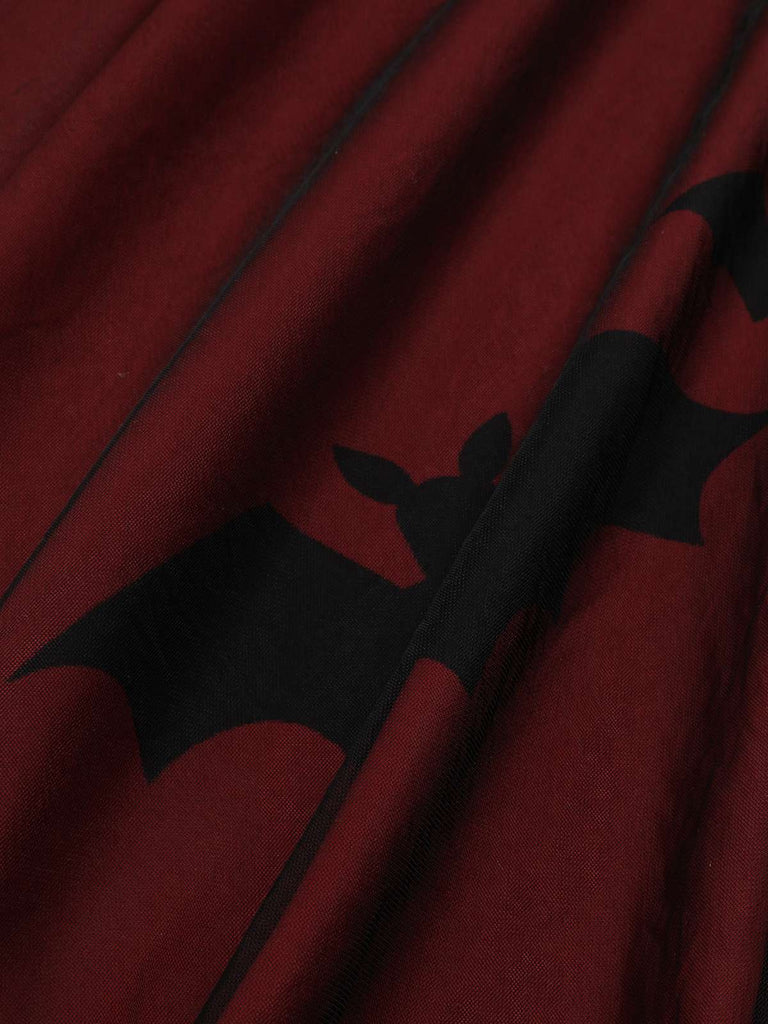 Robe en maille noire et rouge chauve-souris des années 1950