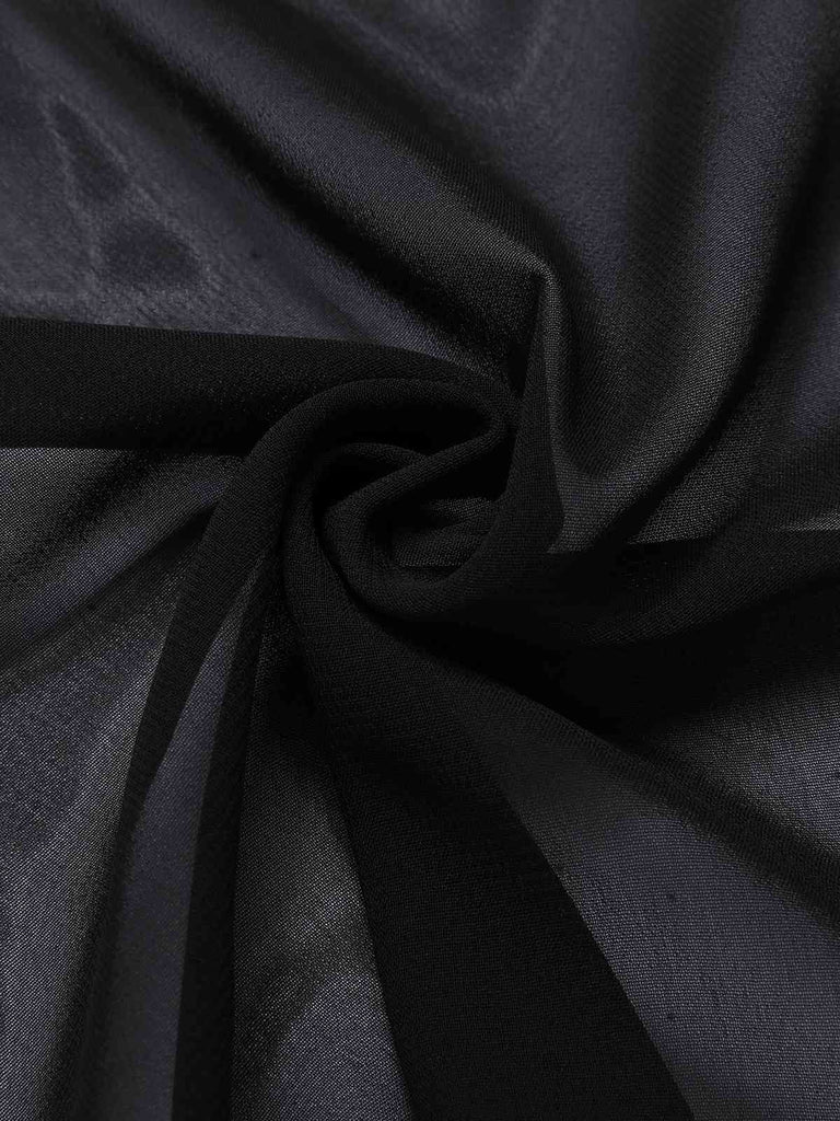 Cape transparente noire à ailes de chauve-souris des années 1950