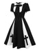 [Pré-vente] Robe patchwork noire à nœuds croisés des années 1950