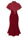 Robe sirène noire à pois et col noué des années 1930