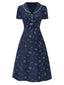 Robe bleu à manches bouffantes et revers fleuris des années 1940