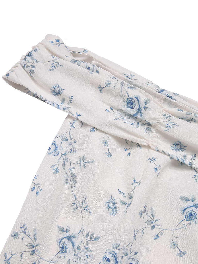 Robe bleue à volants et épaules dénudées à motif floral des années 1930