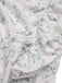 Robe bleue à volants et épaules dénudées à motif floral des années 1930