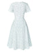 Robe blanche en coton fleurs avec ceinture des années 1940