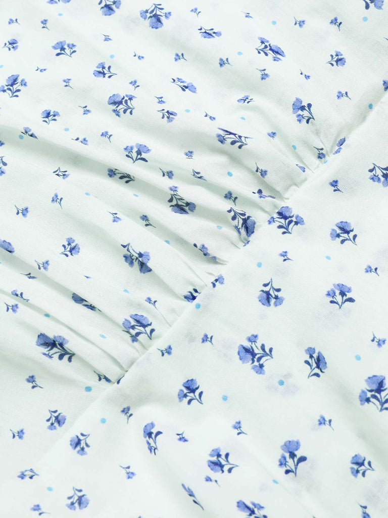 Robe blanche en coton fleurs avec ceinture des années 1940