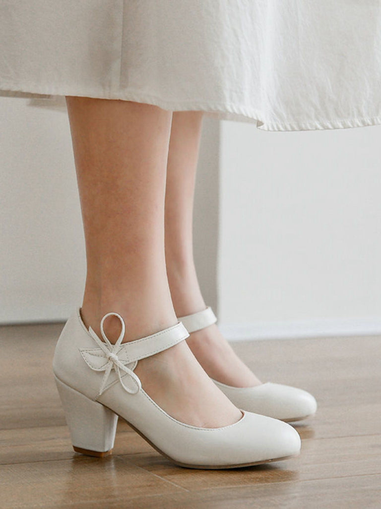 Escarpins rétro à bout rond et nœud papillon à talons épais